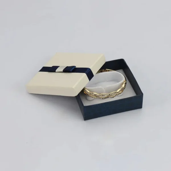 Durable rigid bracelet box with elegant design.