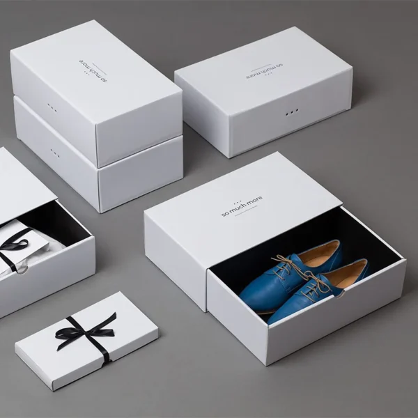 High-end rigid shoe box with soft-touch and foil finish.